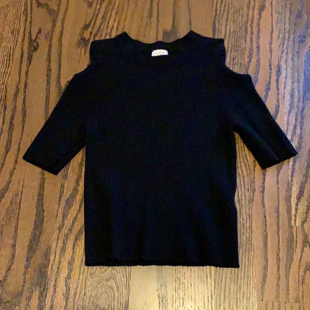 black open shoulder shirt